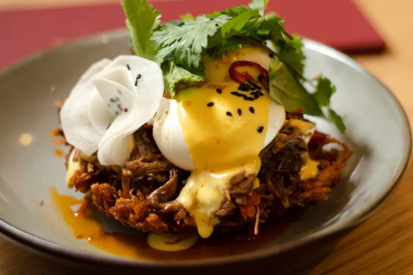 12 Hour Sticky Braised Beef, House Rosti, Pickled Daikon & Poached Eggs Topped with Horseradish Hollandaise GFO + Broccolini